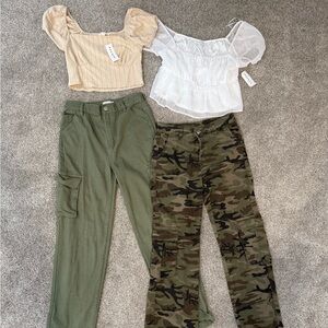 2 cute outfits. Shirts size smalls NWT, pants new condition.